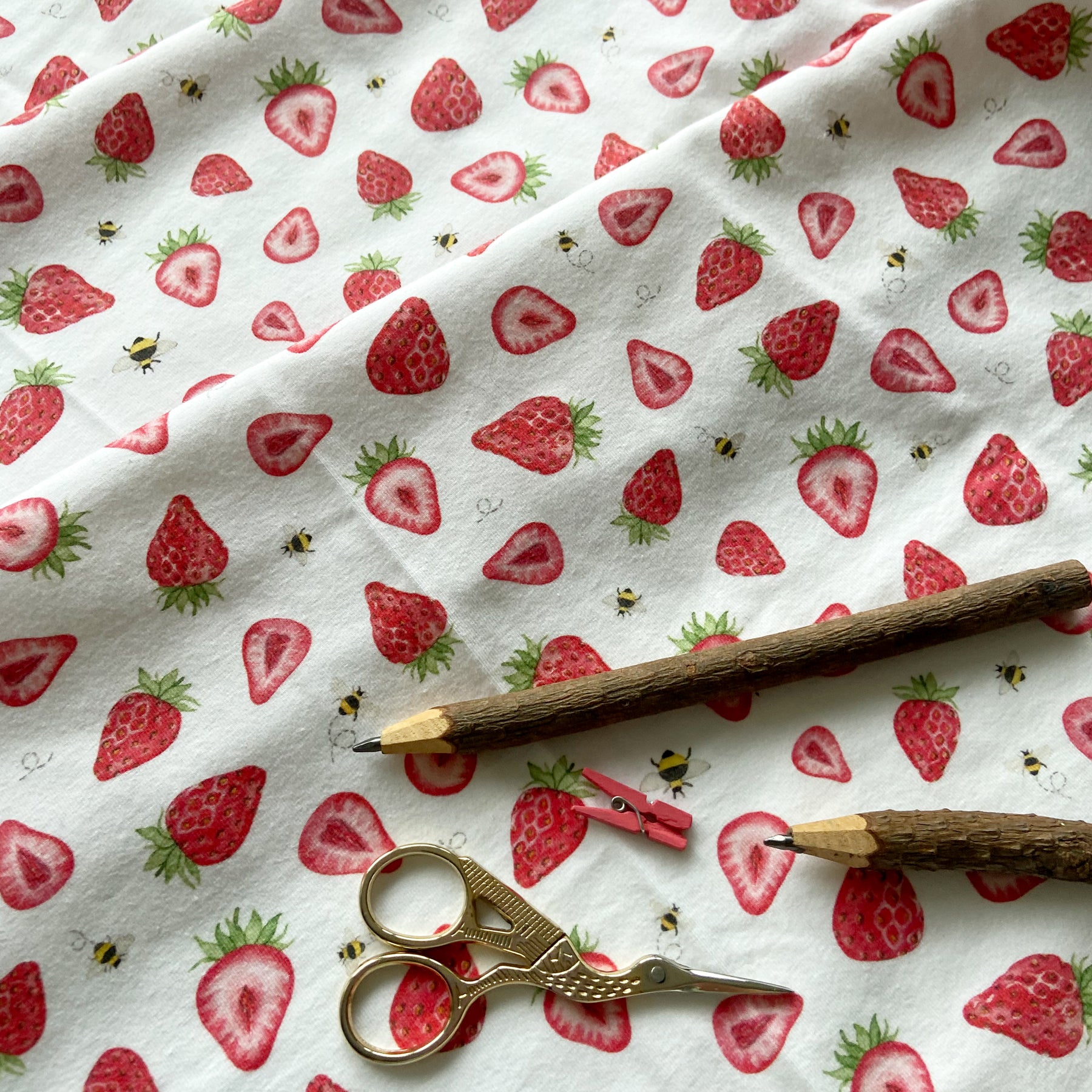 1m + small strawberry organic jersey fabric